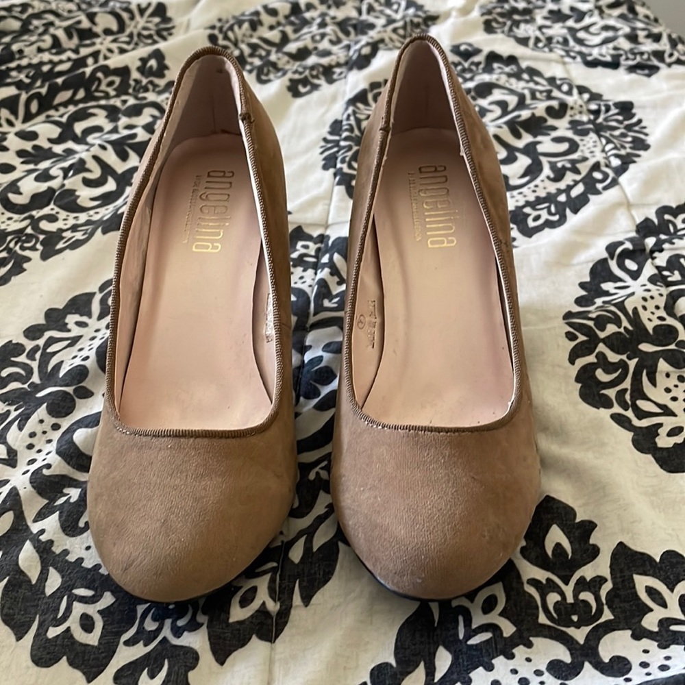 Love these cute heels. Worn once only because I thought I could walk on heels.